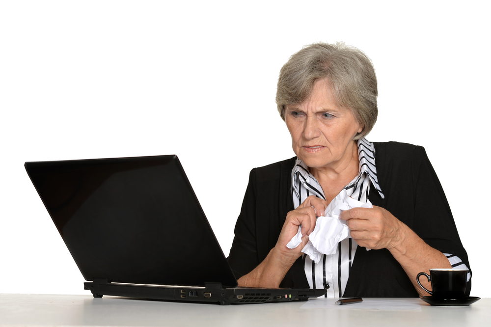oldersomean sad at computer.jpg